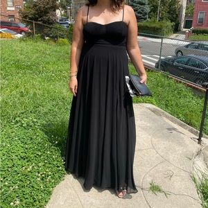 Floor length black gown with slit